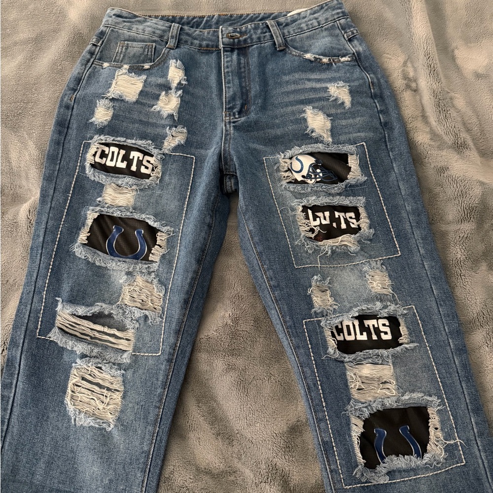 Blue Distressed Jeans with Unique Patches